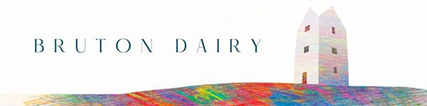 Bruton Dairy logo with a colourful lighthouse on a white background